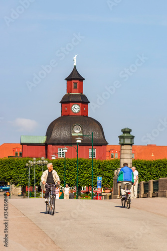 City hall in Lidkoping with cyclists photo