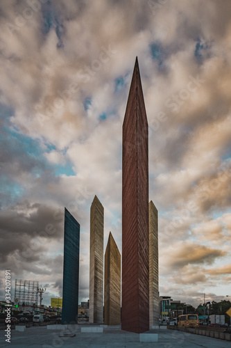 Torres de Satelite (Satellite Towers) monument landmark. Five iconic triangular towers along the highway traffic. photo