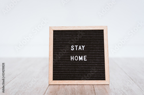 letter board with STAY HOME message. coronavirus convid 2019 concept photo