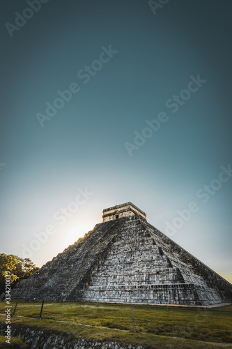 View of the Mayan pyramid of Kukulcan El Castillo. Ruins of the ancient Mayan city, one of the most visited archaeological sites in Mexico. photo
