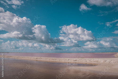 Las Coloradas, salt pink lagoon, beautiful pink water and clear blue sky near Rio Lagartos, Yucatan, Mexico photo