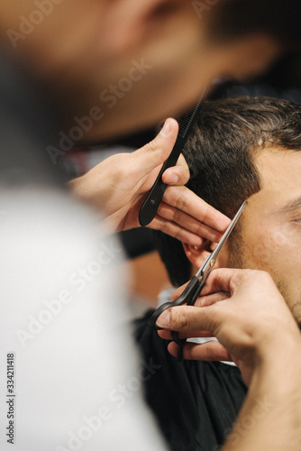 hairdresser cutting hair