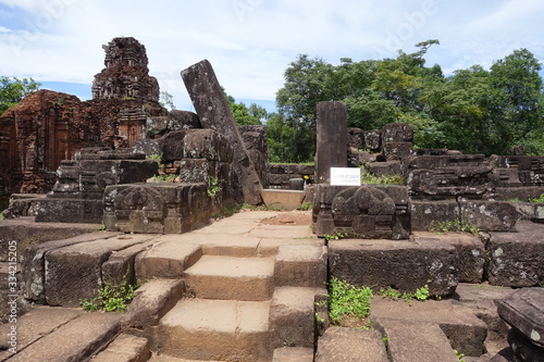 It is a photograph of My Son Sanctuary. It is a sacred site of the ancient Champa Kingdom in Quang Nam Province, central Vietnam. In 1999, it was registered as a UNESCO World Heritage Site.