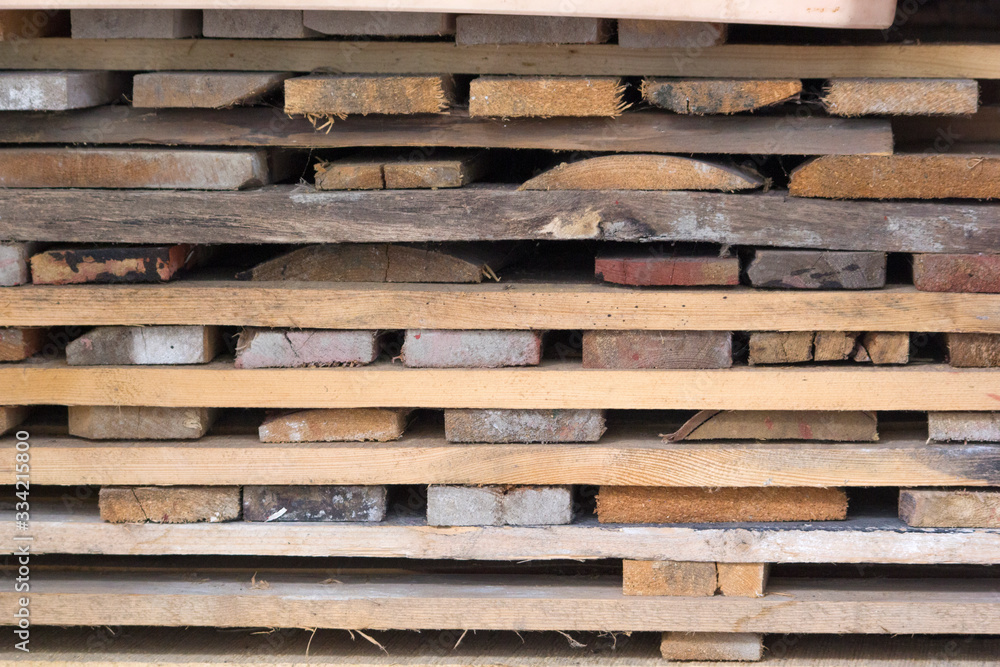 short clipped boards lie in pallets. They've been cut recently.Background short clipped boards lie in pallets. They've been cut recently.Background