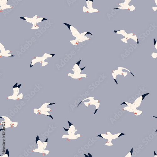 Seagulls seamless pattern.  Cute hand drawn pattern for kids on blue background. Cartoon childish seagull for wrapping paper  fabric  textile  wallpaper  home decor
