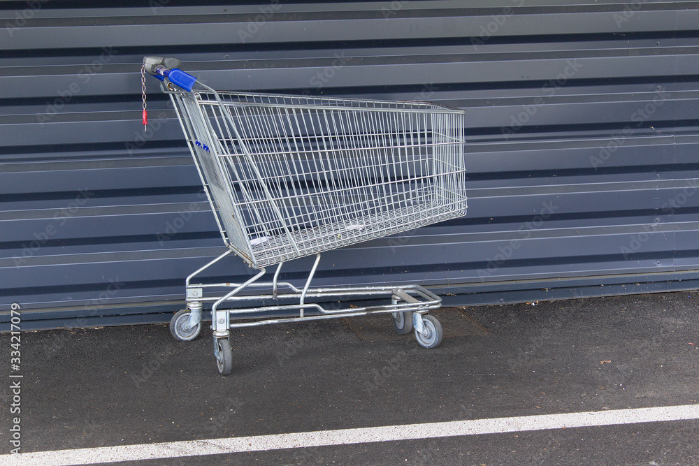 empty shopping cart on the nobody street empty shopping cart on the nobody street