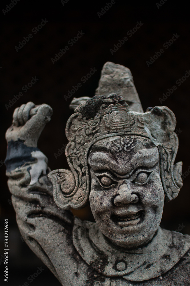 Buddhist stone lion statue