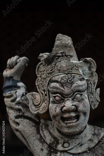 Buddhist stone lion statue