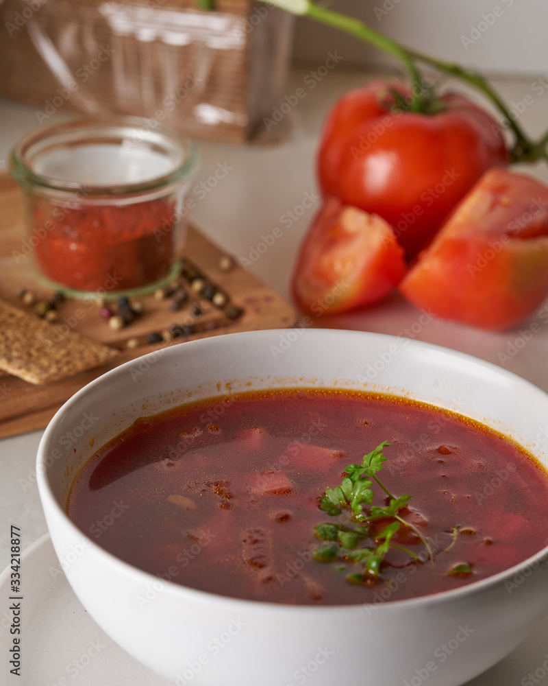 Vegan red soup in white plate Vegan red soup in white plate