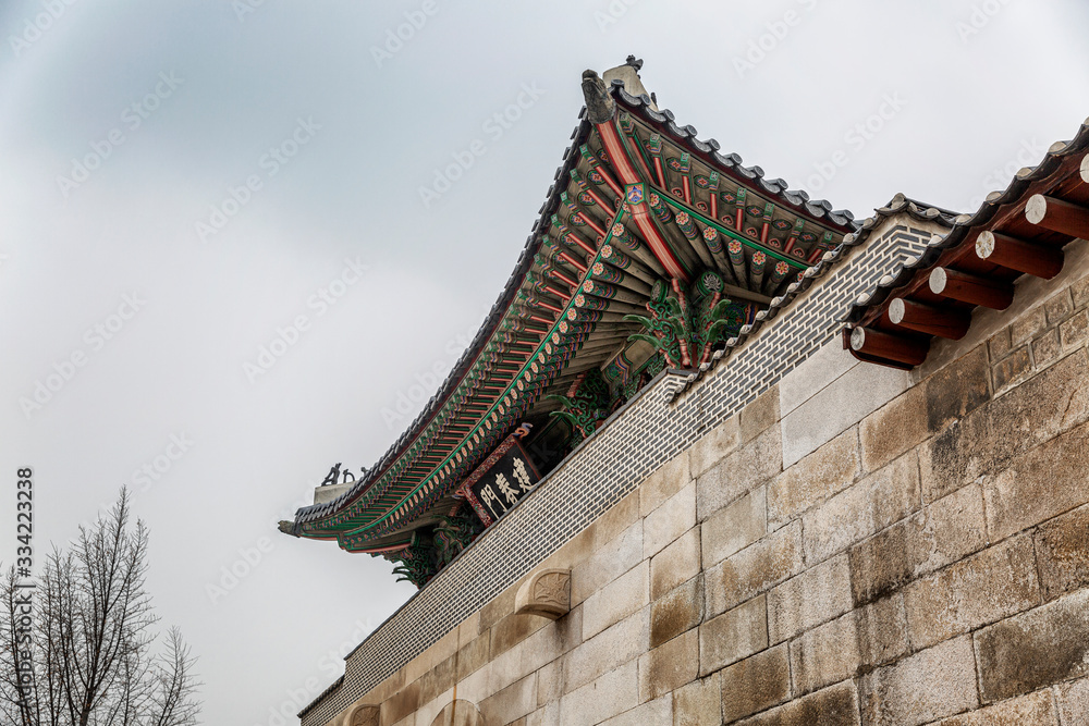 Roof of a beautiful Korean Pagoda in Seoul Park against the sky. Bottom view. Close-up.