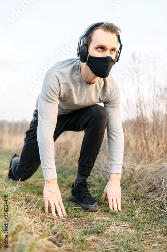 Healthy lifestyle. Guy in a black medical mask © Vadim Pastuh