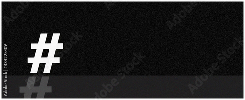 # white hashtag reflective symbol on minimal black background.