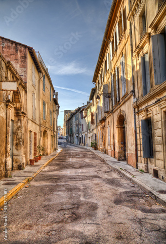Street with historical houses in Arles  France