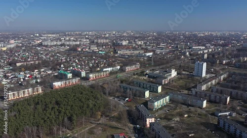 Sovetsky district. Gomel. Belarus. The view from the height of Rechitsky Prospekt. View of the city from a height. Residential buildings, roads, factories and enterprises. photo