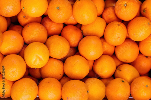 Fototapeta Naklejka Na Ścianę i Meble -  Orange fruits - Pile of orange fruits