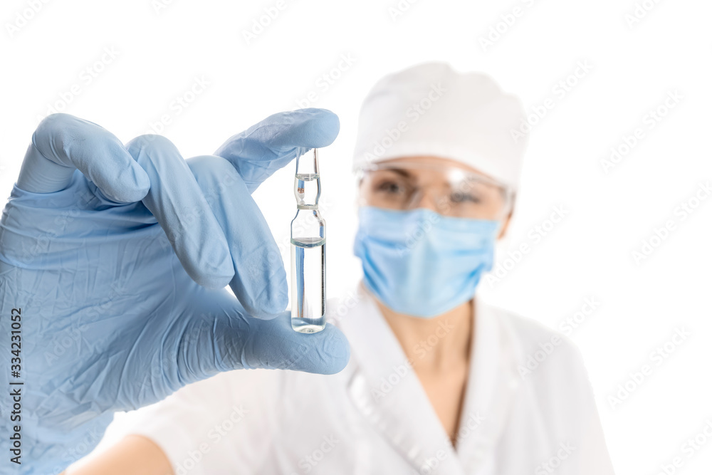A doctor or scientist in laboratory holding ampoule vaccines for children or older adults, or cure animal diseases. Concept:diseases,medical care,science, anesthesia,euthanasia,diabetes. A doctor or scientist in laboratory holding ampoule vaccines for children or older adults, or cure animal diseases. Concept:diseases,medical care,science, anesthesia,euthanasia,diabetes.