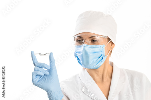 A doctor or scientist in laboratory holding ampoule vaccines for children or older adults, or cure animal diseases. Concept:diseases,medical care,science, anesthesia,euthanasia,diabetes.
