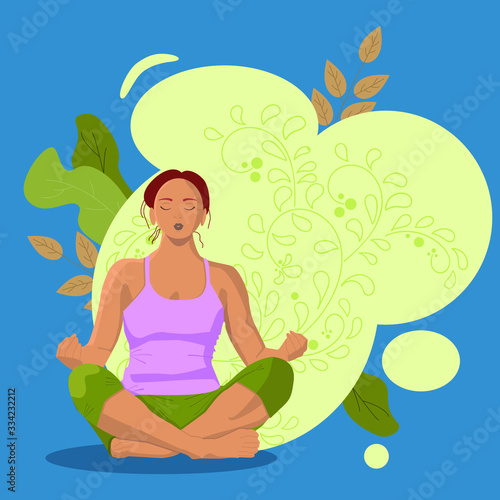 Girl performing yoga exercise on the background of abstract spots and floral pattern.