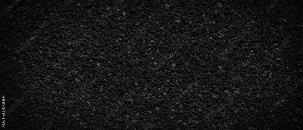 Fototapeta premium Black background made of small gravel - gravel path texture - aquarium background texture
