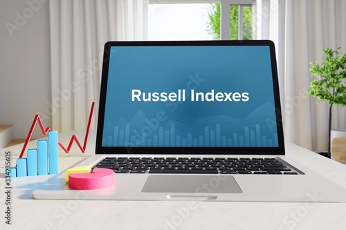 Russell Indexes – Statistics/Business. Laptop in the office with term on the Screen. Finance/Economy.