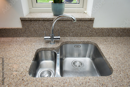 modern high standard kitchen with sink and tap