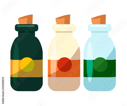 Color glass bottle with cork set isolated on white