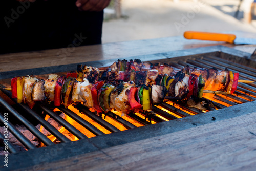 Delicious skewers grilled with chicken and vegetables