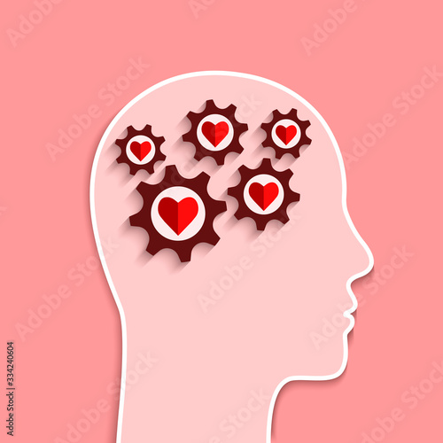 Mental health and emotional well-being concept. Human head and gears with heart shapes inside as brain and mind symbol.
