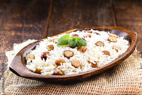 rice with pine nuts, typical Brazilian food during the winter. Meal made with pinaceaes and araucariaceaes, served hot. IN Brazil it is called 