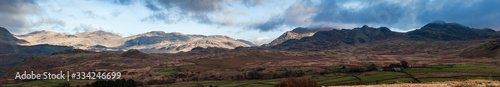 A five image panorama of the Lake District Southern Fells, with Harter Fell right of centre and Scafell on the left, Cumbria, England.