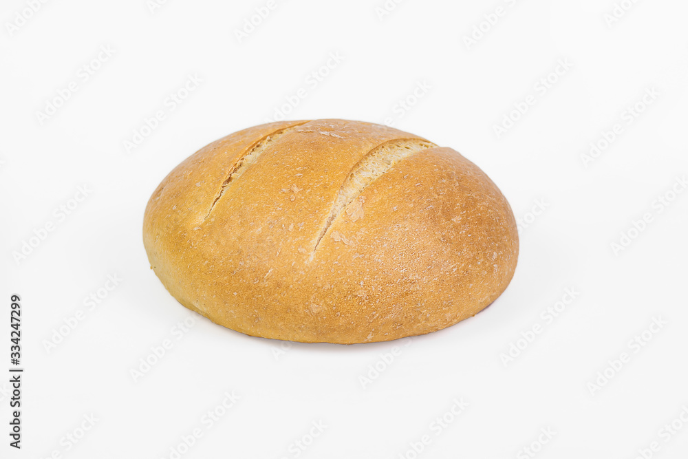 Fresh bakery product. Bread. White round wheat bread isolated on white background. Top view and copy space for text.