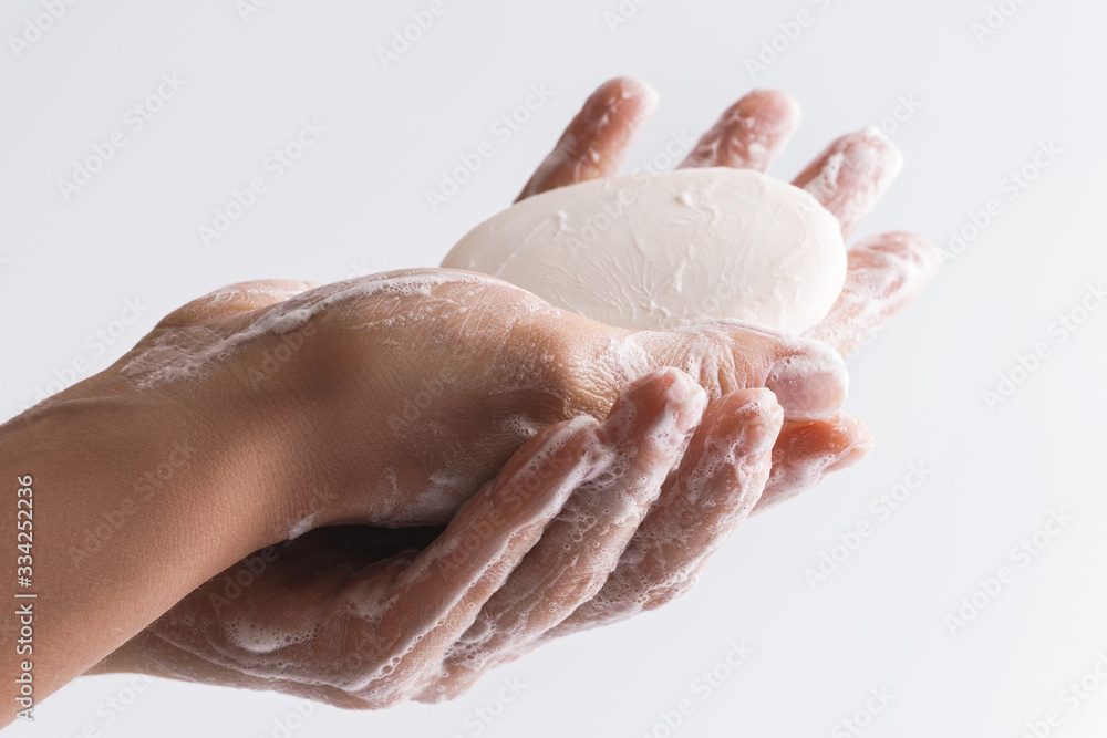 Close-up of female hands with a soap Close-up of female hands with a soap