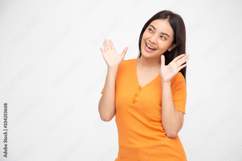 Portrait of excited screaming young asian woman standing isolated over green background, Wow and surprised concept Portrait of excited screaming young asian woman standing isolated over green background, Wow and surprised concept
