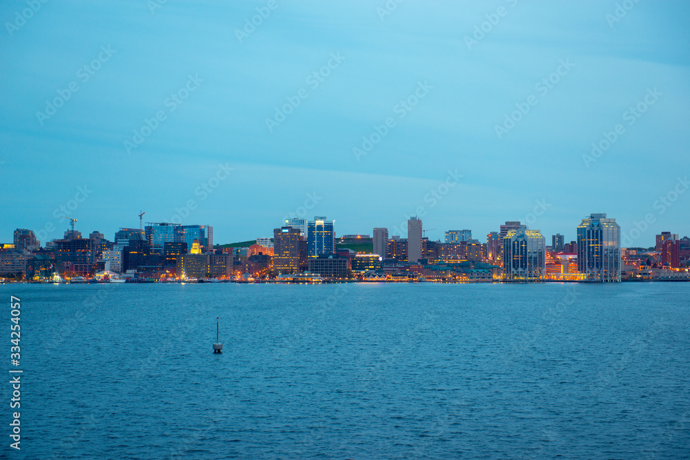 Halifax City skyline at night from Dartmouth waterfront, Nova Scotia NS, Canada.