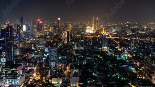 Wallpaper Mural Bangkok business district city center, with buildings and skyscrapers, rush hour traffic, at night – Time Lapse Torontodigital.ca