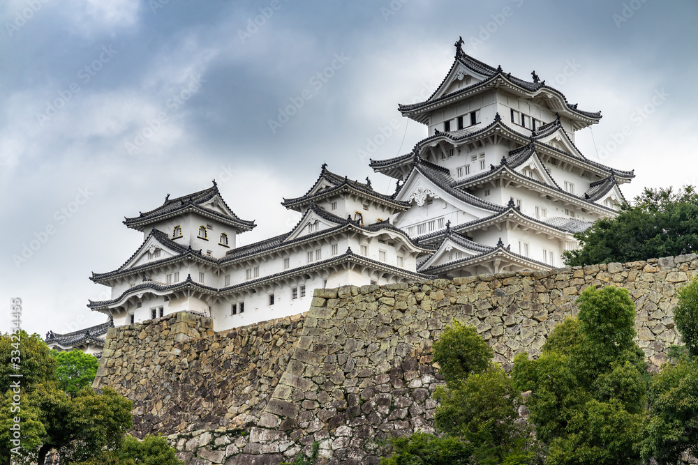 Scenic cloudy sky over Himeji Castle, a popular tourist attraction of Japan and UNESCO World Heritage Site Scenic cloudy sky over Himeji Castle, a popular tourist attraction of Japan and UNESCO World Heritage Site