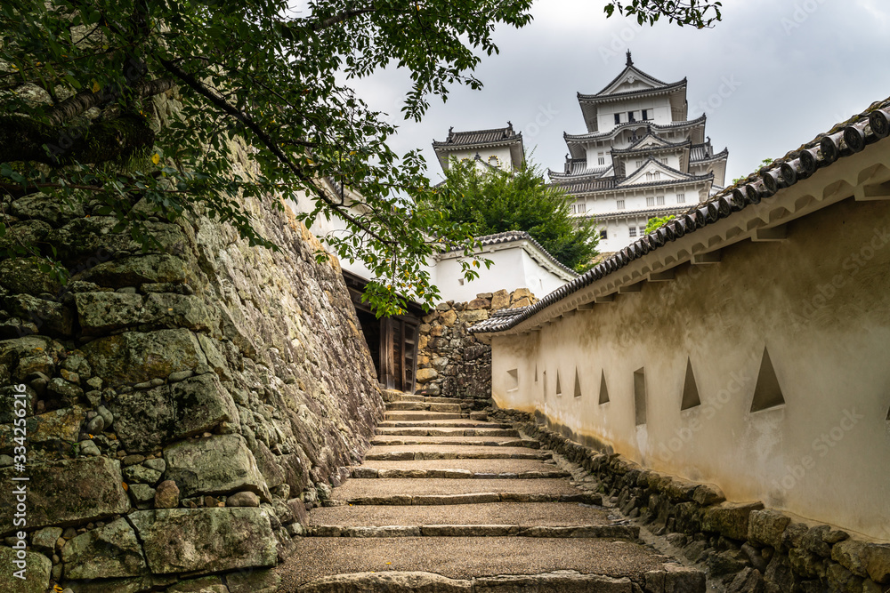 Scenic view of a steep and narrow walkway controlling the access to the Himeji Castle, Japan