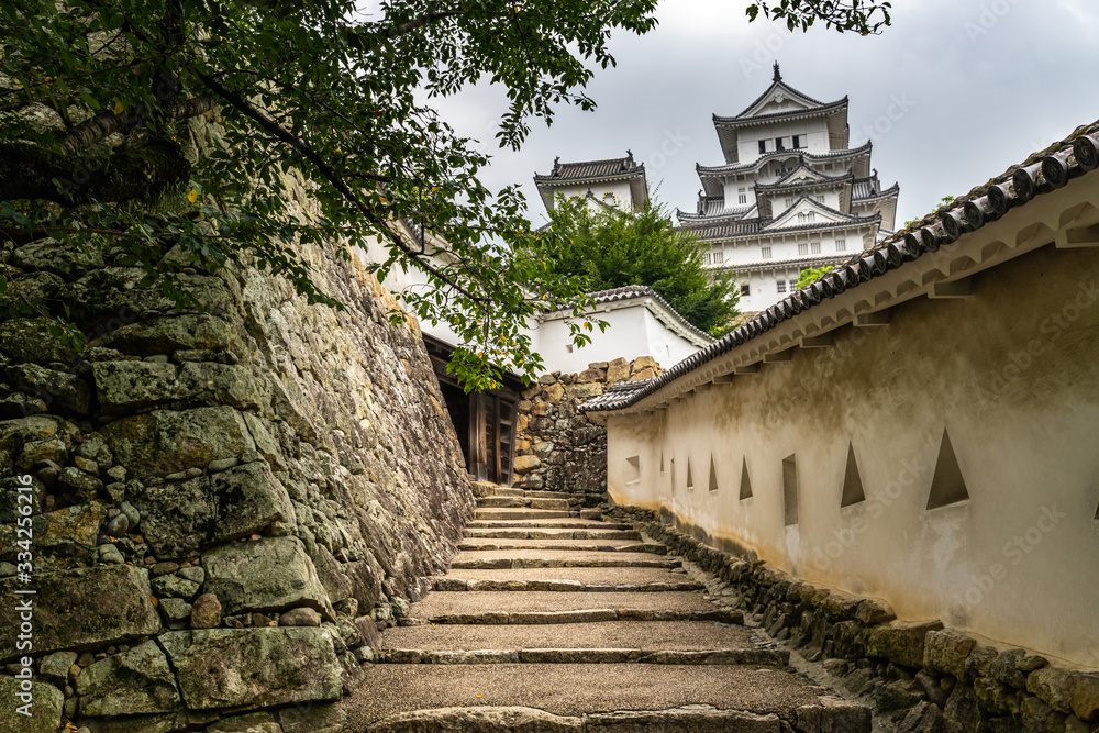 Scenic view of a steep and narrow walkway controlling the access to the Himeji Castle, Japan Scenic view of a steep and narrow walkway controlling the access to the Himeji Castle, Japan