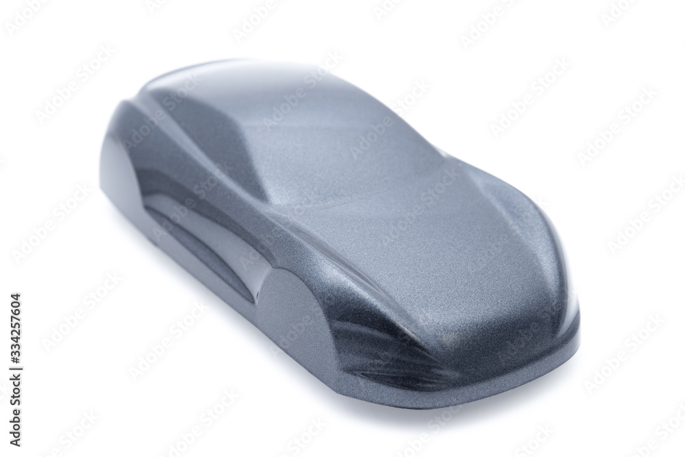 Abstract car color sample with very narrow focus at smooth shape on white background Abstract car color sample with very narrow focus at smooth shape on white background