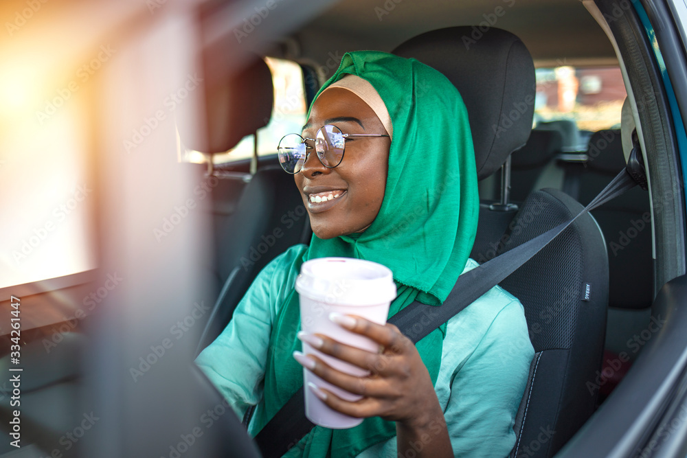 young-african-muslim-woman-driving-a-car-muslim-woman-driving-car-and