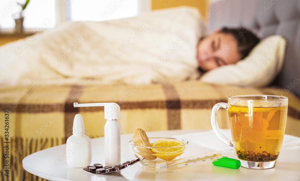 Girl has symptoms of respiratory viral infection and lying in the bed Girl has symptoms of respiratory viral infection and lying in the bed