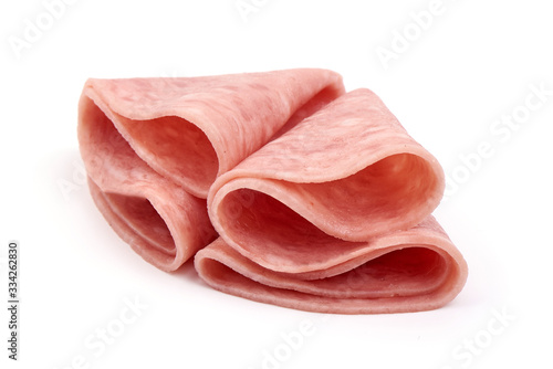 Smoked sausage slices, thinly sliced sausage, isolated on white background