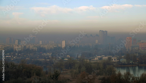 Smog over the buildings and quarters of Kiev