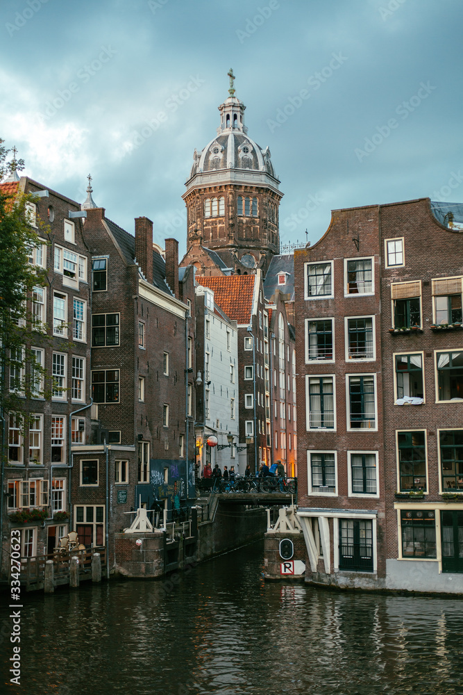 Amsterdam / Netherlands - September 2016: Narrow canals in the historical center of city