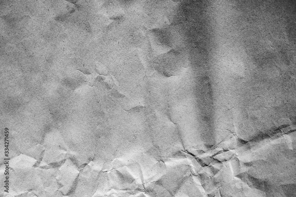 Naklejka premium a Crumpled white paper background texture
