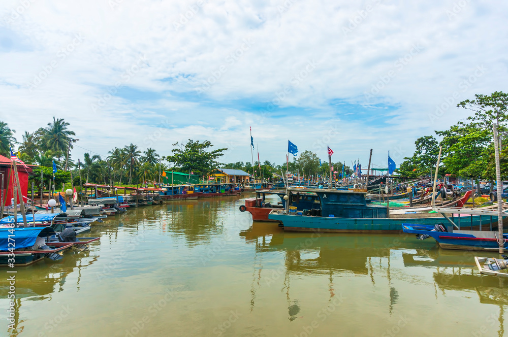 JOHORE, MALAYSIA - 21 DECEMBER 2013 : Boats park at Pantai Leka Jetty, Johore. Pantai Leka jetty is the most attractive for photographer and visitor with nice landscape and natural view.