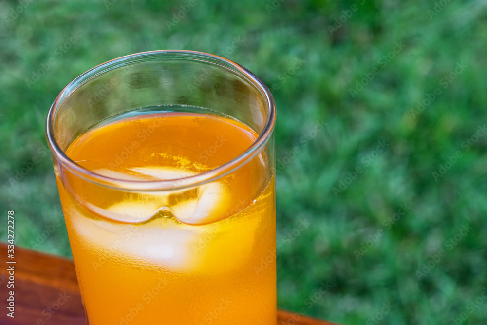 glass of fresh orange drink glass of fresh orange drink
