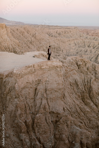 man looking out at the badlands anza borrego desert