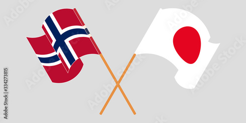 Crossed and waving flags of Norway and Japan