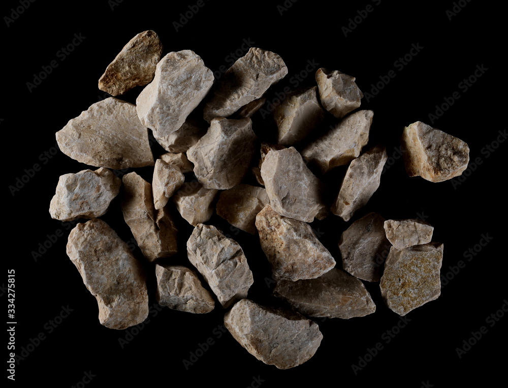 White rock isolated on black background and texture, clipping path, top view White rock isolated on black background and texture, clipping path, top view